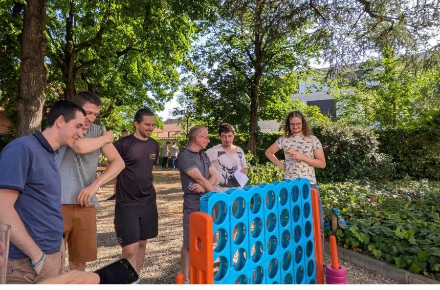 SuperGrid Institute colleagues taking part in games